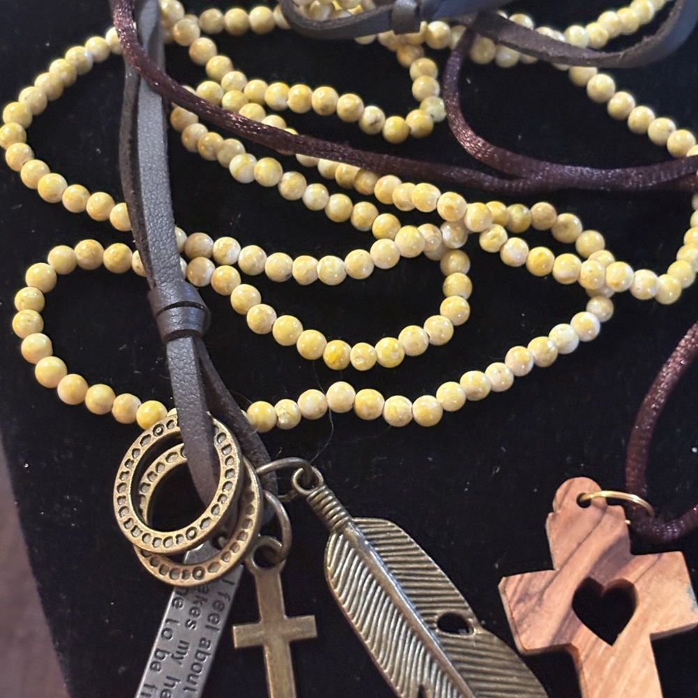 1 Yellow Beaded Necklace 2 leather string necklaces with charms and wood cross